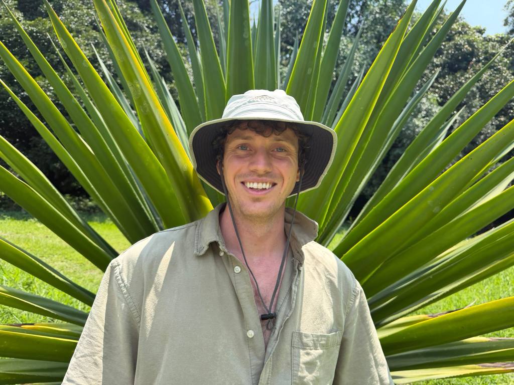 Joe from Joe Grows, a Perth gardener, smiling in a garden